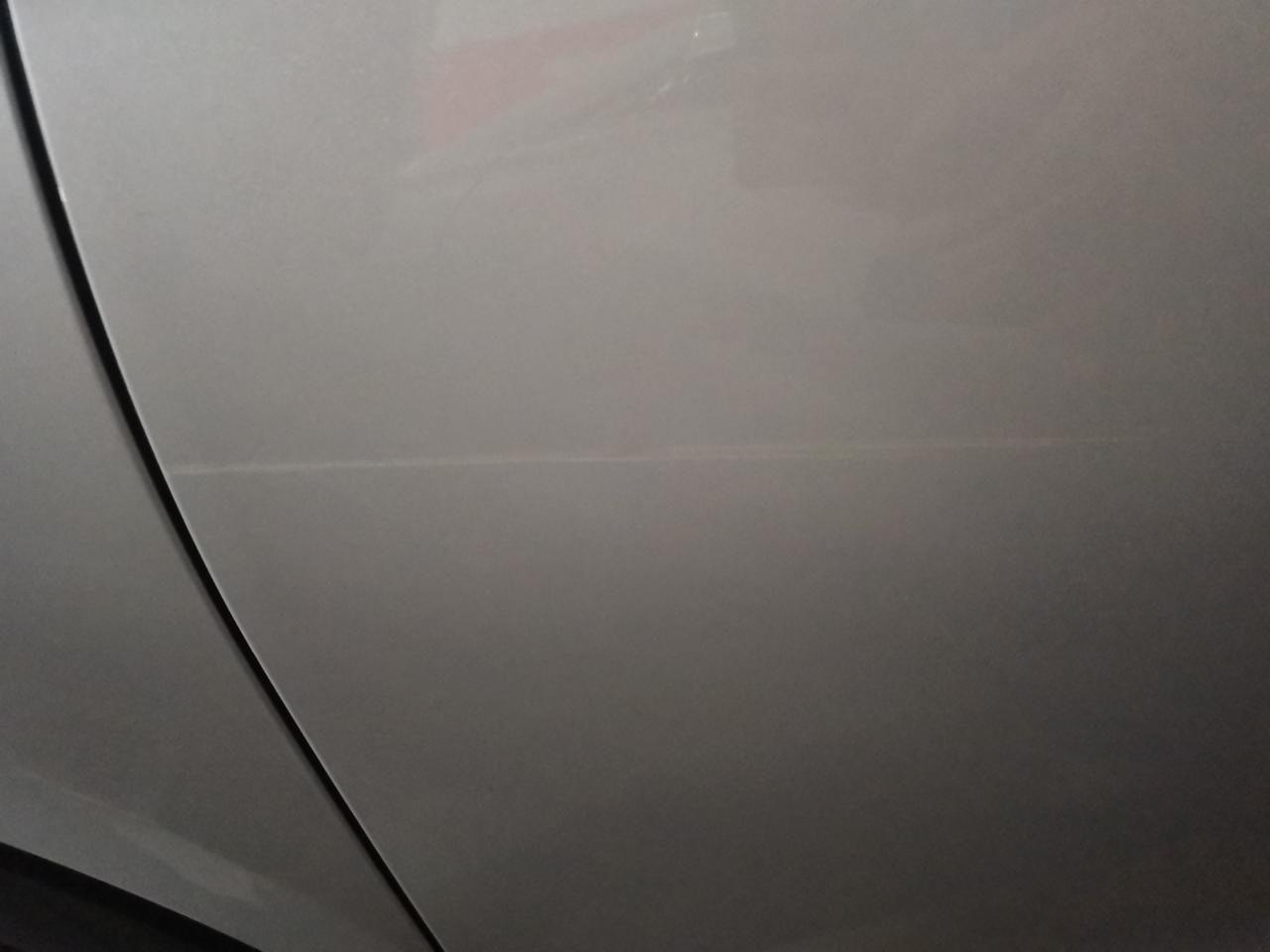 比亚迪宋PLUS DM-i 驾驶位车门被刮了一条，新车提车时做过镀晶，刮后又做了镀晶，没效果怎么补救，求大神指点，谢谢！