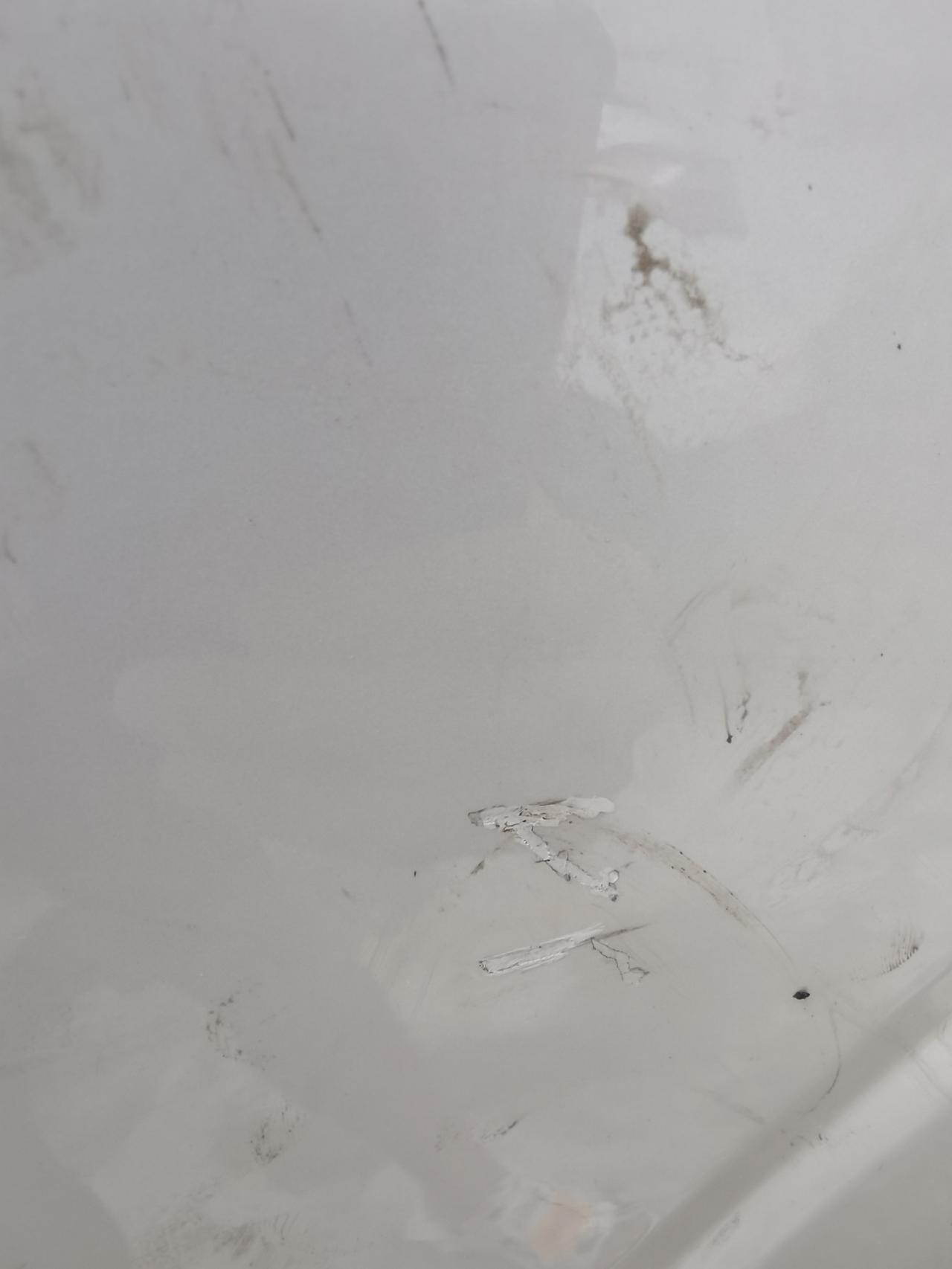 沃尔沃XC60 这种怎么修复 不知道咋弄的 左后车门上有个这种形状的  4s修复大概多少钱