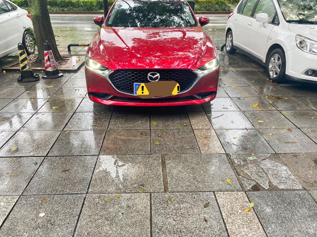 马自达3 昂克赛拉 我请教一下问题啊 我的车不是换了高配灯了吗 行驶证上面还是低配的 以后要是别人把我的灯搞坏了 是按照