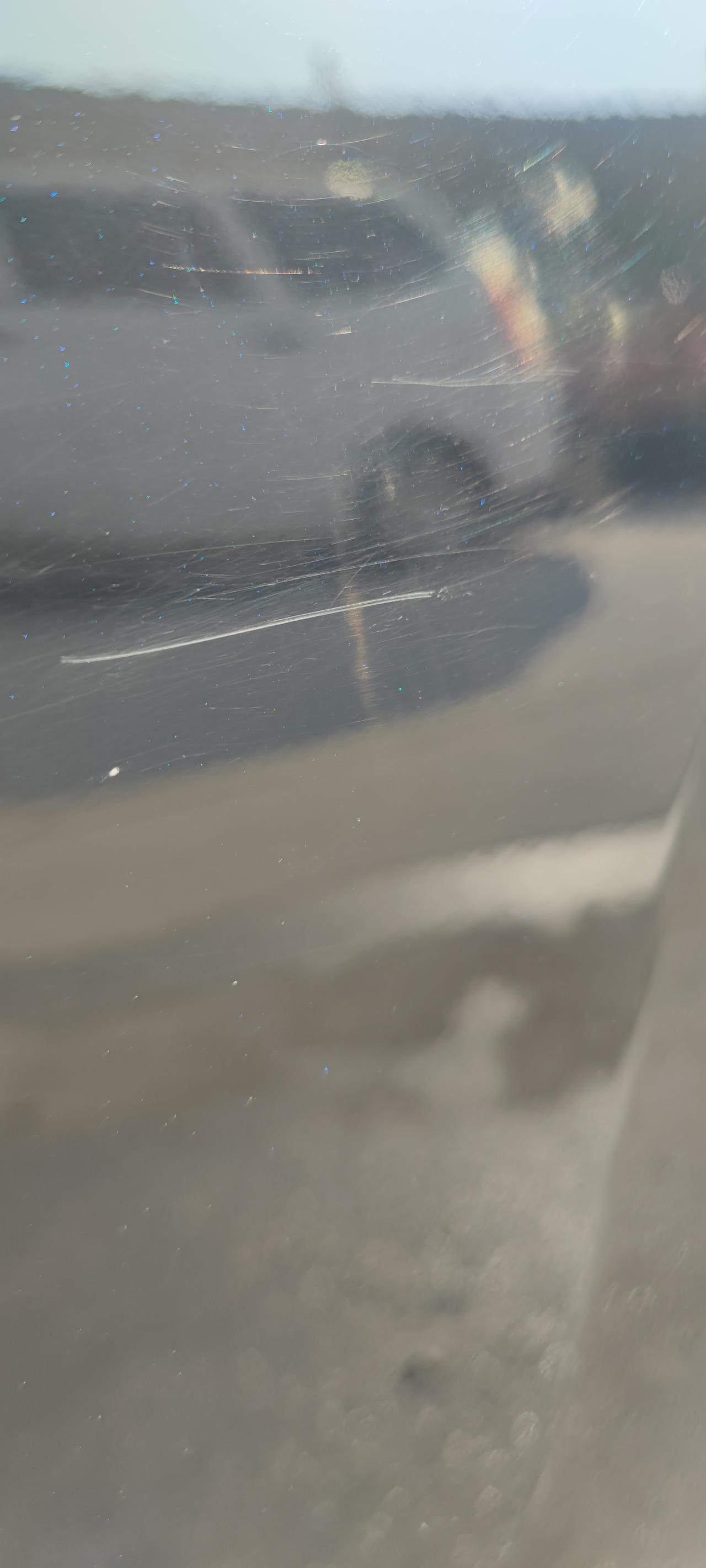 起亚智跑 友友们能看出这是划的新车腊还是车漆啊？