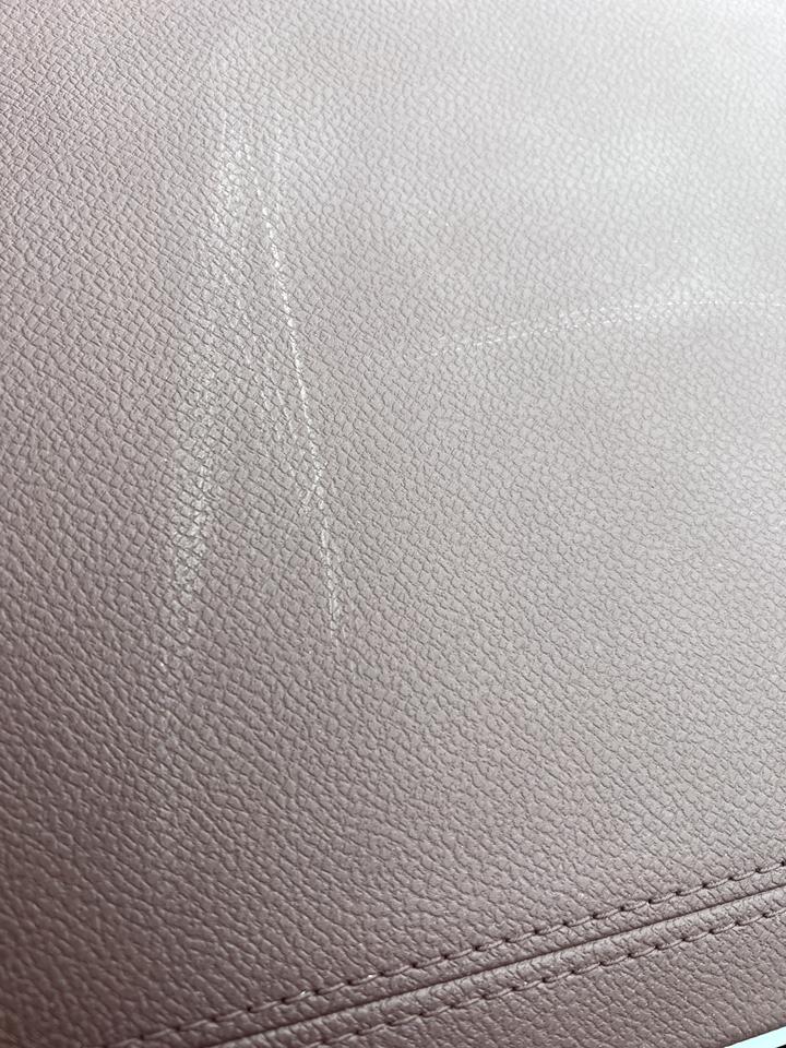 吉利星越L 怎么处理呢 我就是用干毛巾擦了几下就成这样了 现在怎么办呢