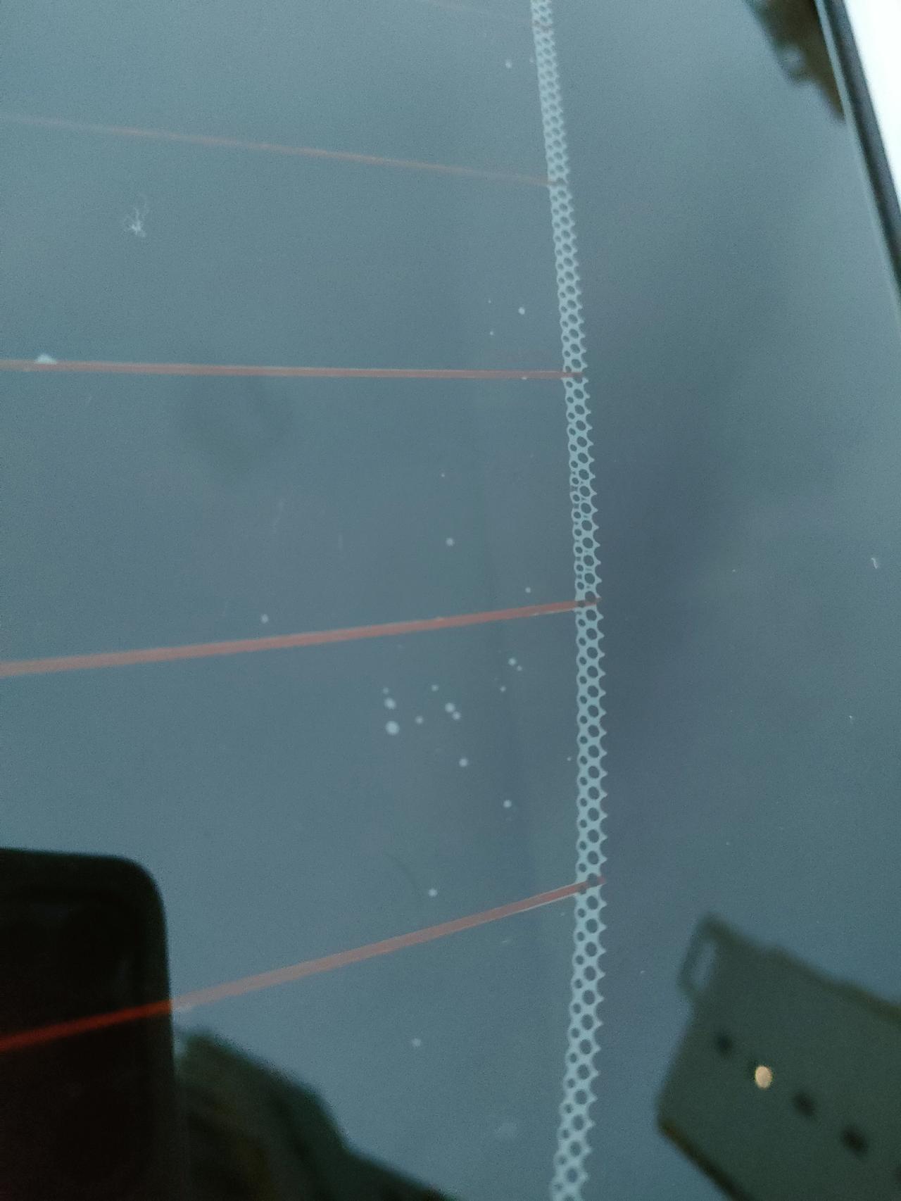 马自达3 昂克赛拉 刚贴两个月玻璃膜，有气泡了，怎么办