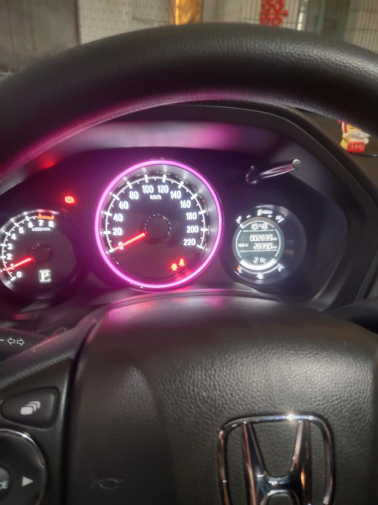 本田XR-V XRV1.5L，仪表盘这个灯是什么意思？一会绿一会粉的，新手不懂意思，来个大神解释一下，对车有没有影响