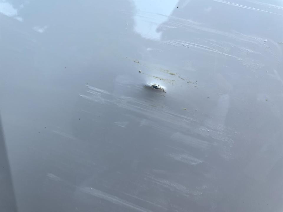 别克英朗 刮成这样该怎么弄？