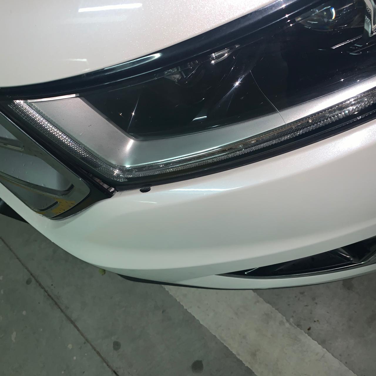 福特锐界 哥哥们，这个左前大灯和前进气格栅中间怎么有这么大个缝啊，有没有遇到的哥哥们，我没碰没撞，就成了这样了，怎么处理