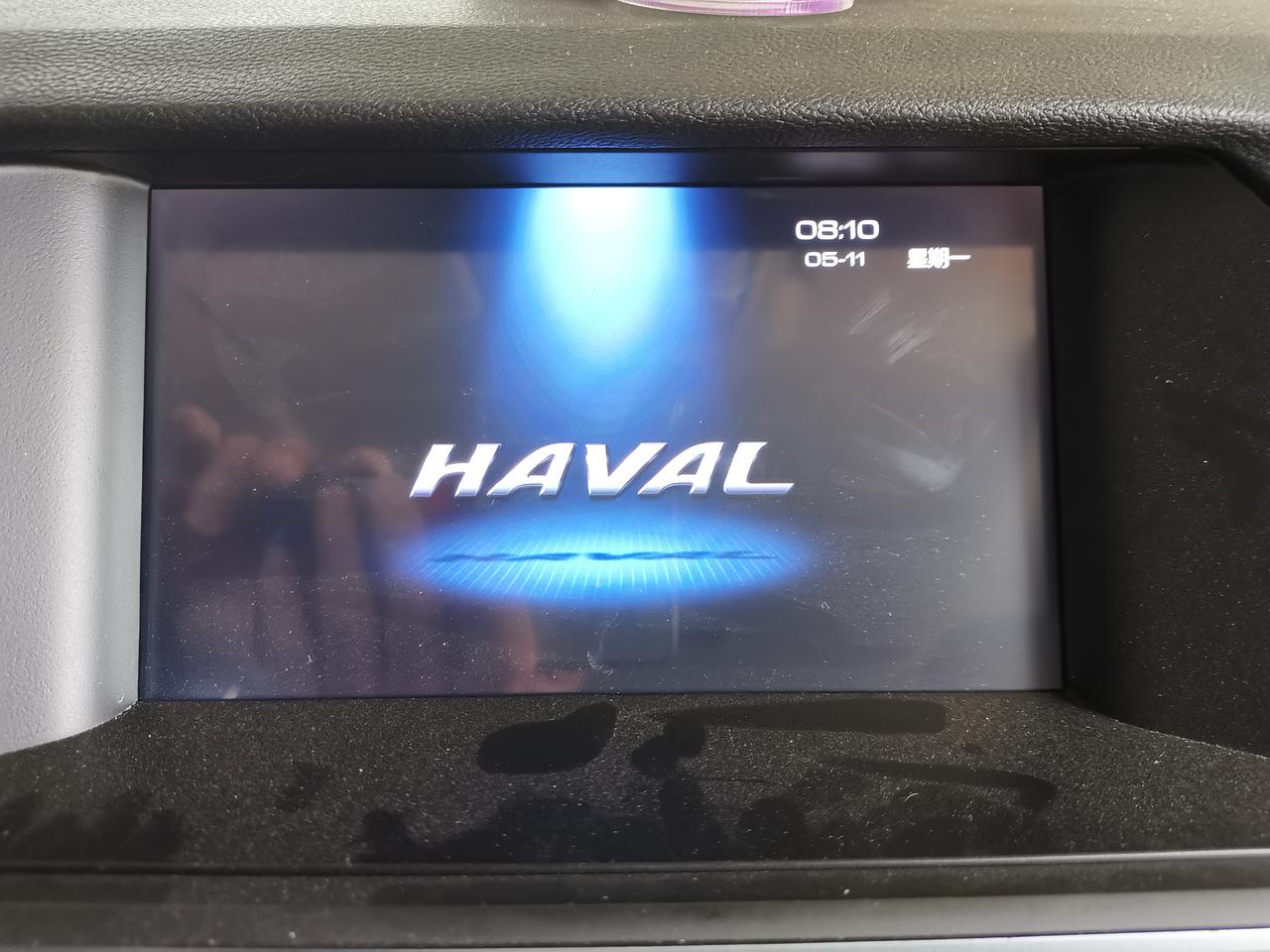 哈弗H618款自动挡精英型。哪位朋友帮忙看看这显示屏怎么回事？怎么调回原来的
