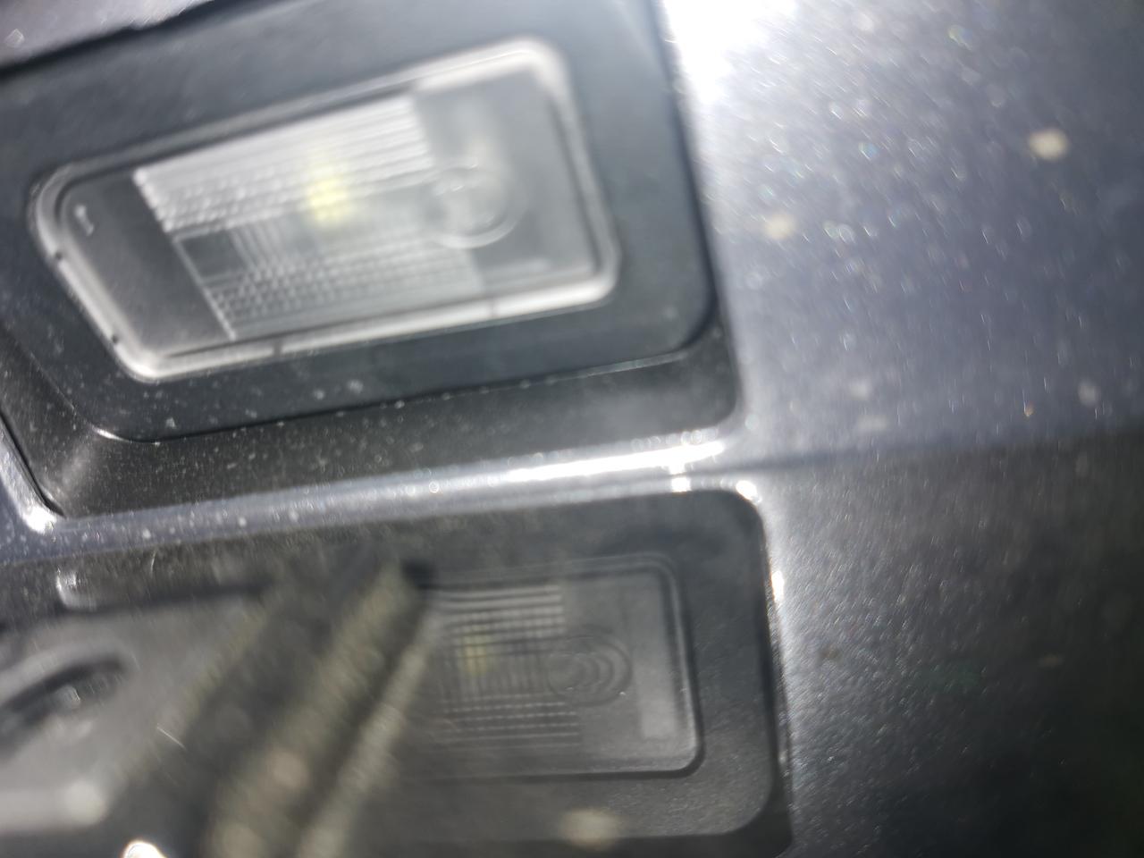 比亚迪秦PLUS DM-i 后行车记录仪你们是装在哪里 是黏在后玻璃上还是在倒车影像旁边开两个螺丝孔   ，我找这车型的