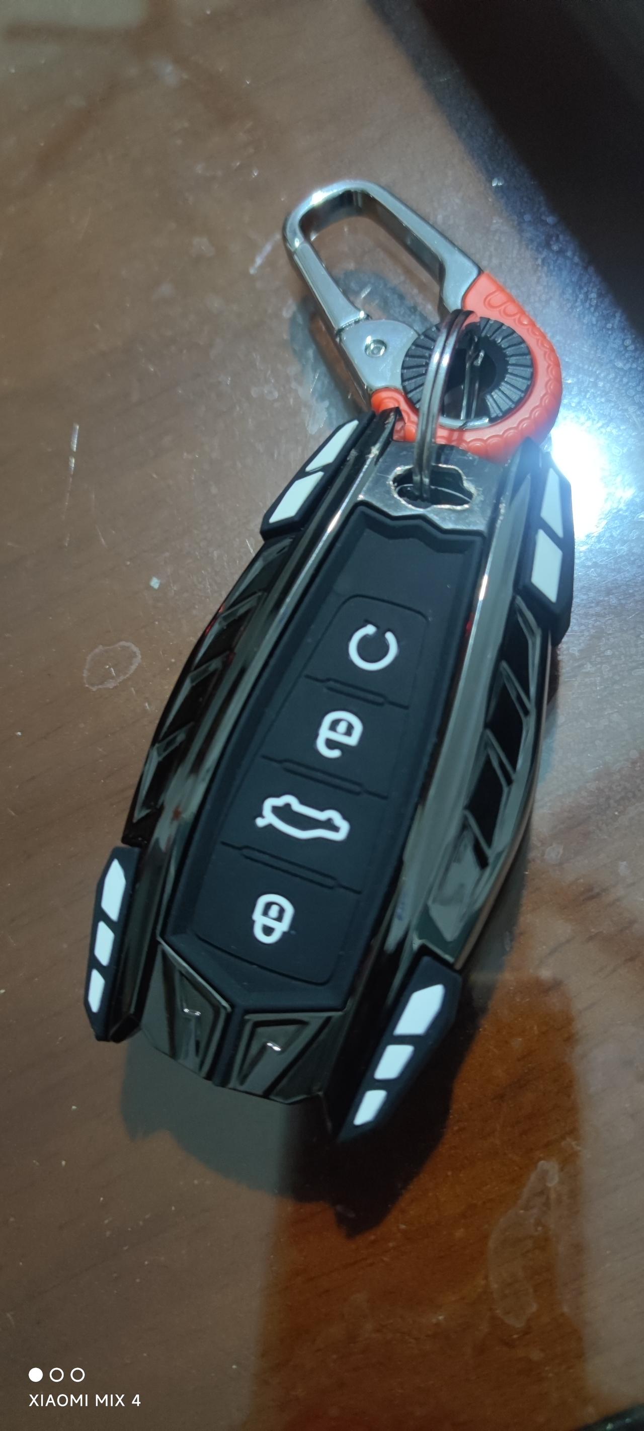 星越L后背门，用遥控什么方法打开？？在遥控器上怎么按？？？