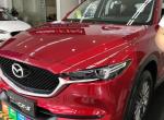 马自达cx-5-各位朋友，今天交钱了，19.98万那款马自达国六的2.0L自动两驱智享型红色的，四川某市优惠1.7万，红色漆加钱3000，购置税上牌所有一共算下来20.88万元，这个价钱可以吗，还有提车那天怎么才能看出这车就是我要的这款型号呢