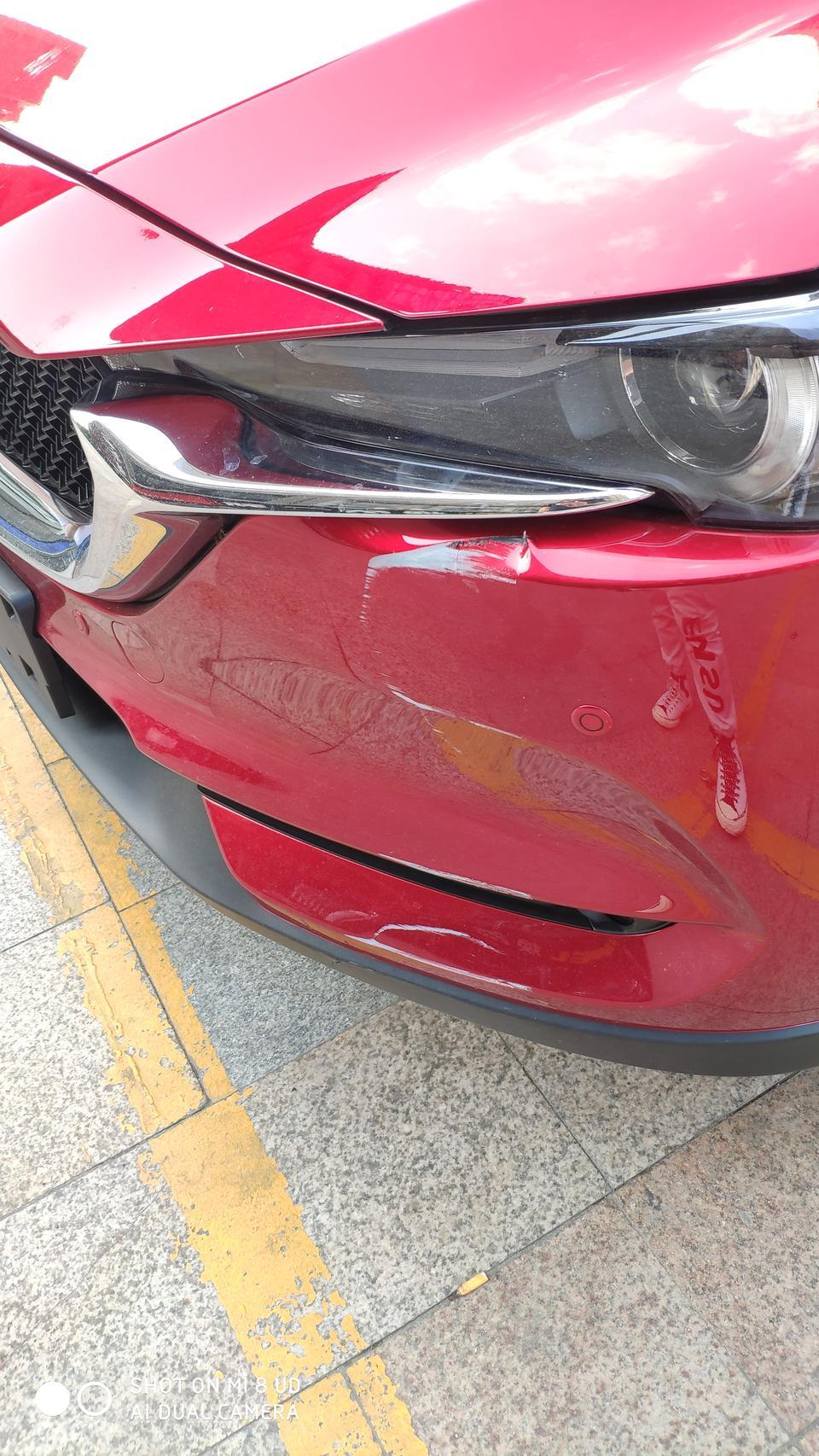 马自达cx-5-马自达cx5  提车一周 驾驶位置车头就在杆子上刮成这样了，请问这个去4s店补要多少钱啊。