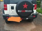 北京bj40-我想请问广大网友，这个车就如图所示，修后面尾部的话能修成多少钱？