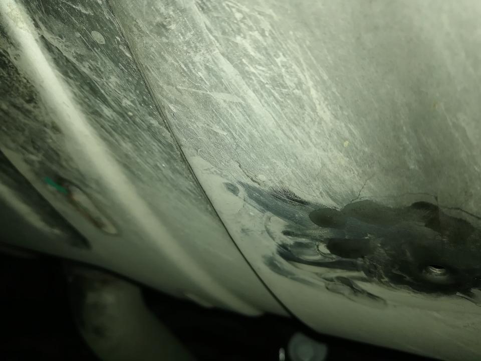 柯迪亚克gt-问一下排气管有这样一个洞是怎么回事，今天下雨这里在滴水不要紧吧