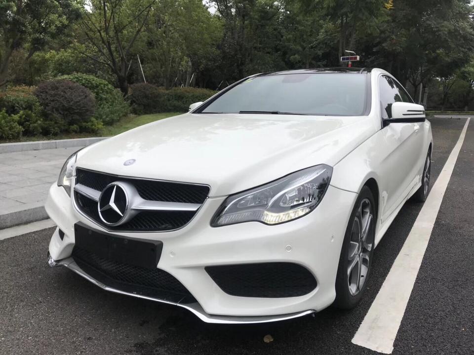 奔驰e级-14年6月，奔驰E2002.0T门轿跑车，新车多少钱?二手车交易多少钱?谢谢15