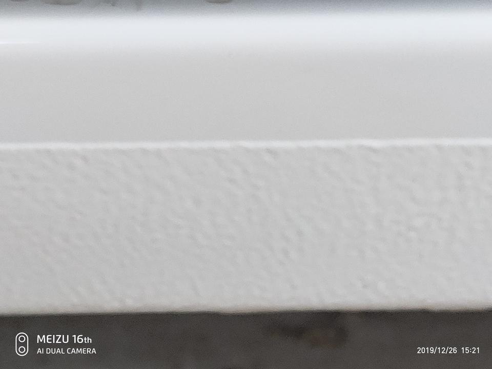 英朗-两侧车门下的油漆起皱，像层死皮似的，这是正常情况吗？