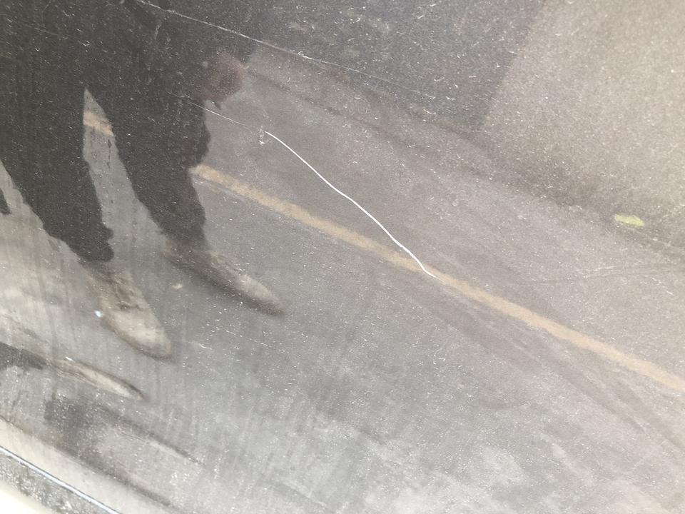 逍客-这样子被刮了 有什么办法处理下吗??