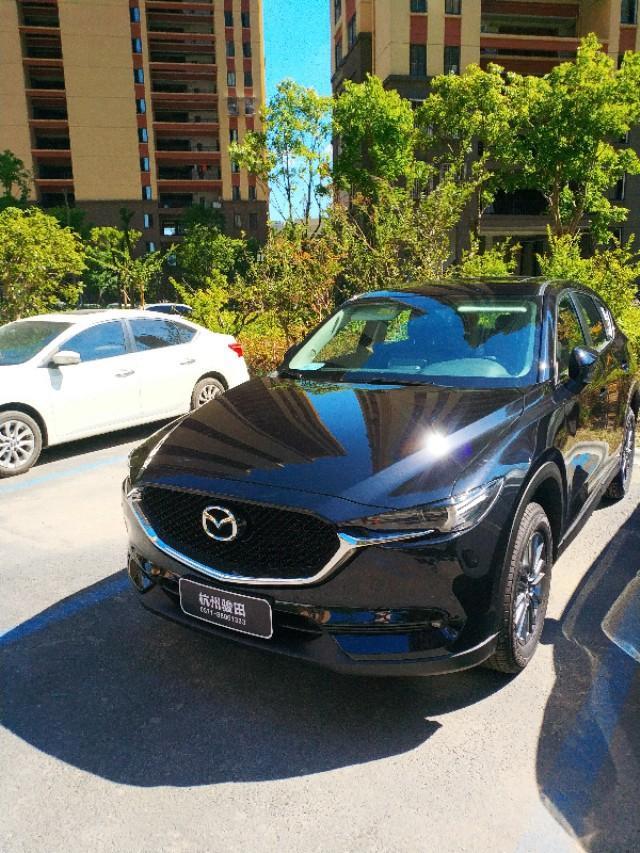 马自达cx-5-cx～5 2.0智尚，油耗多少，表明车总公里数/车路况（城市/市区/一半一半）/是否空调/车常载人数。
