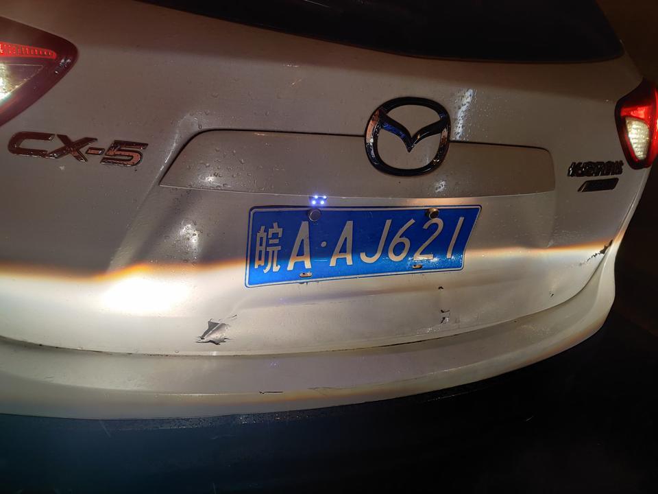 马自达cx-5-这个去4s店修大概多少钱，后背箱陷进去，底下黑色塑料保险杠有一角有点瘪