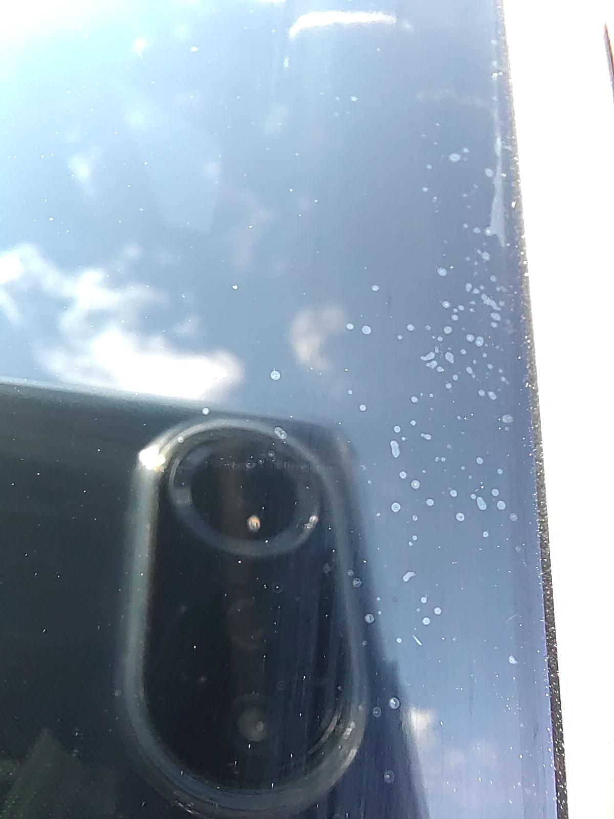 哈弗H6 贴膜第三天，这些气泡和麻点还能晒掉吗？看着感觉里面是灰尘。要不要去找4S店？