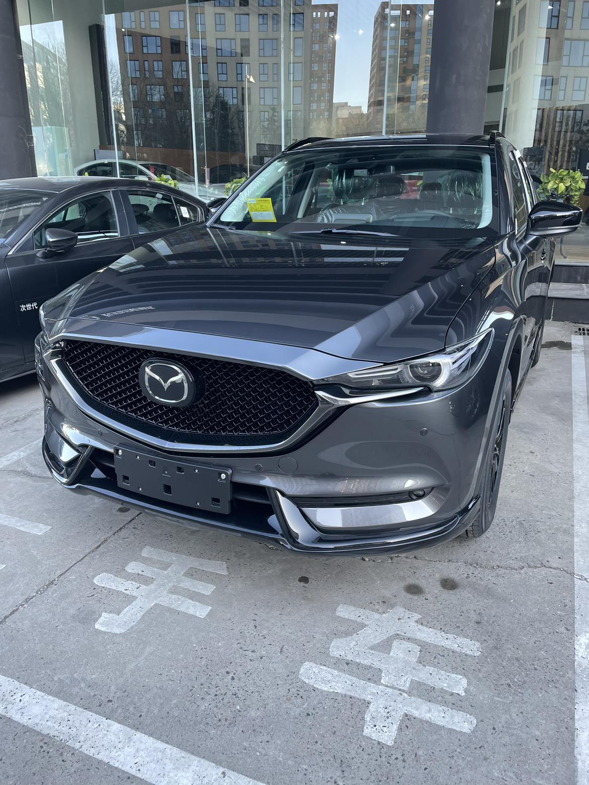 马自达CX-5 请教价格问题 现在是22年1月 想问下买个21年黑骑士2.5l两驱落地大概什么价？买的大神报个价格给小弟