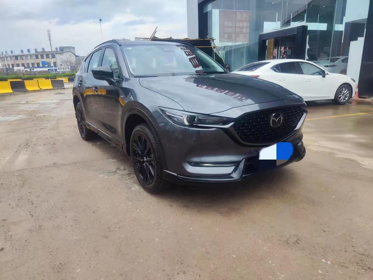 马自达CX-5 21款黑骑士2.5试驾车行程公里已经有四千多公里了 牌照也上了 四儿子店说要二十w还可以往下谈 你们说这