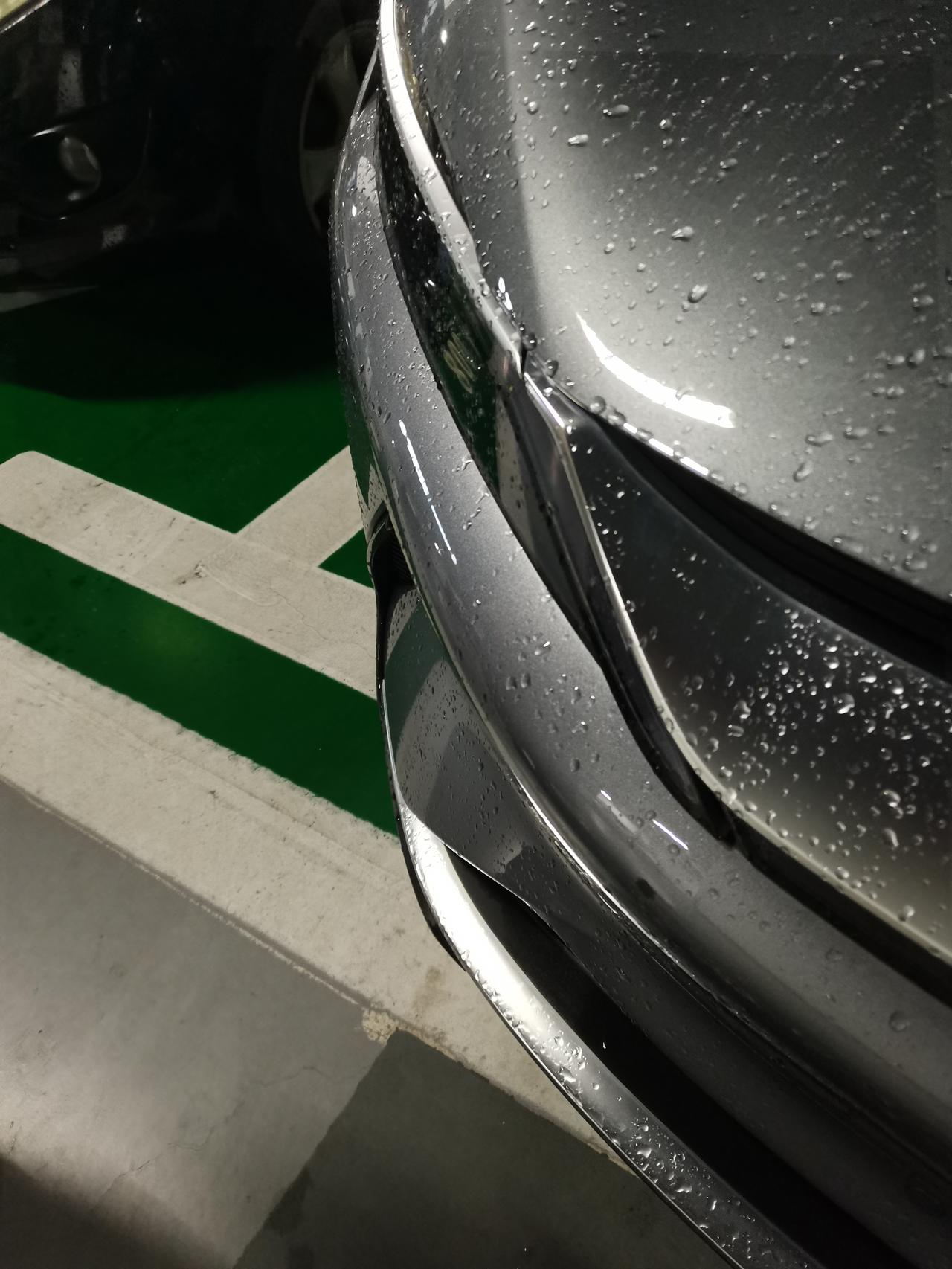 比亚迪汉EV 请问修这要多少钱？当时有事比较着急忘记看了，这是比亚迪汉吗。倒车不小心碰到的，车主不在，我留了我的电话。