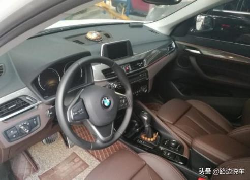 本来买本田CRV，听了朋友的建议提了宝马X1：小了一点，可牌子大