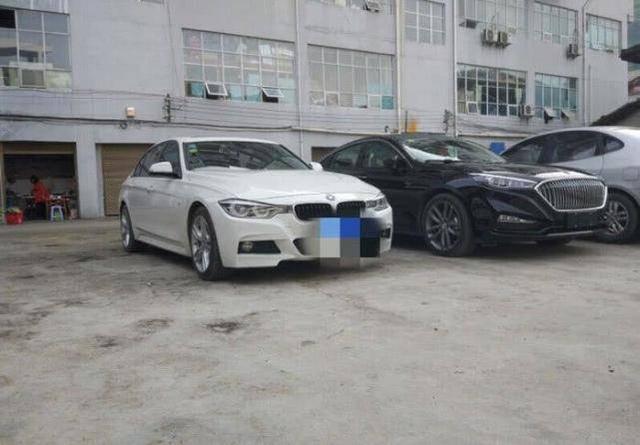 红旗H5停在宝马旁边，车主感慨：还是开红旗有面子