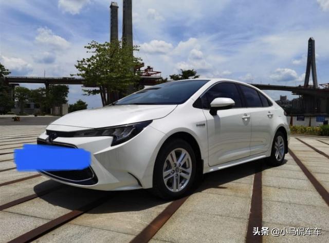 喜提2021款雷凌双擎版，油耗5升，安全配置无敌，这价格不算贵吧